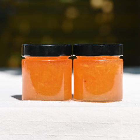 Two jars of peach jam